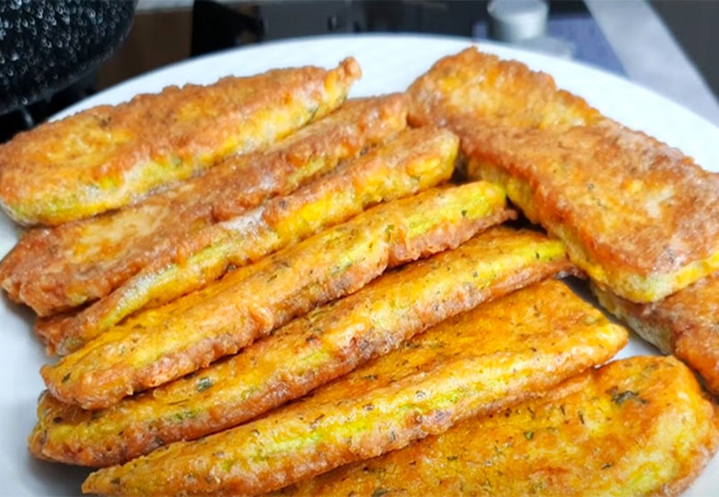 Șnițele din dovlecel, crocante si delicioase cu aluat de brânză pe care le vei prepara cu drag mereu. Datorită unui truc ingenios, gustul lor va încânta întreaga familie